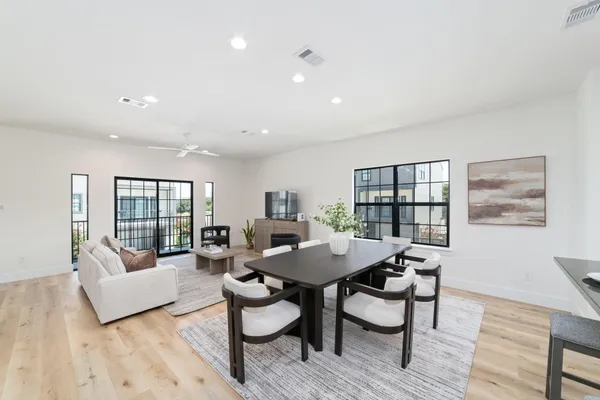 a view of a dining room with furniture window and outside view