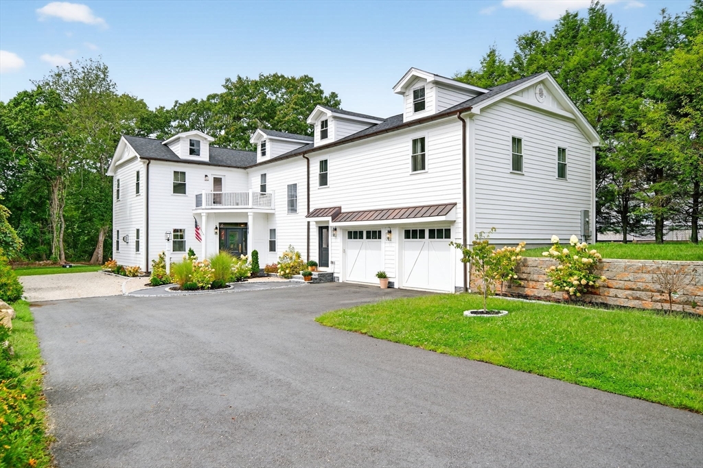 738 Smith Neck Road Dartmouth, MA 02748 - Photo 1 of 42 a front view of a house with a yard and porch