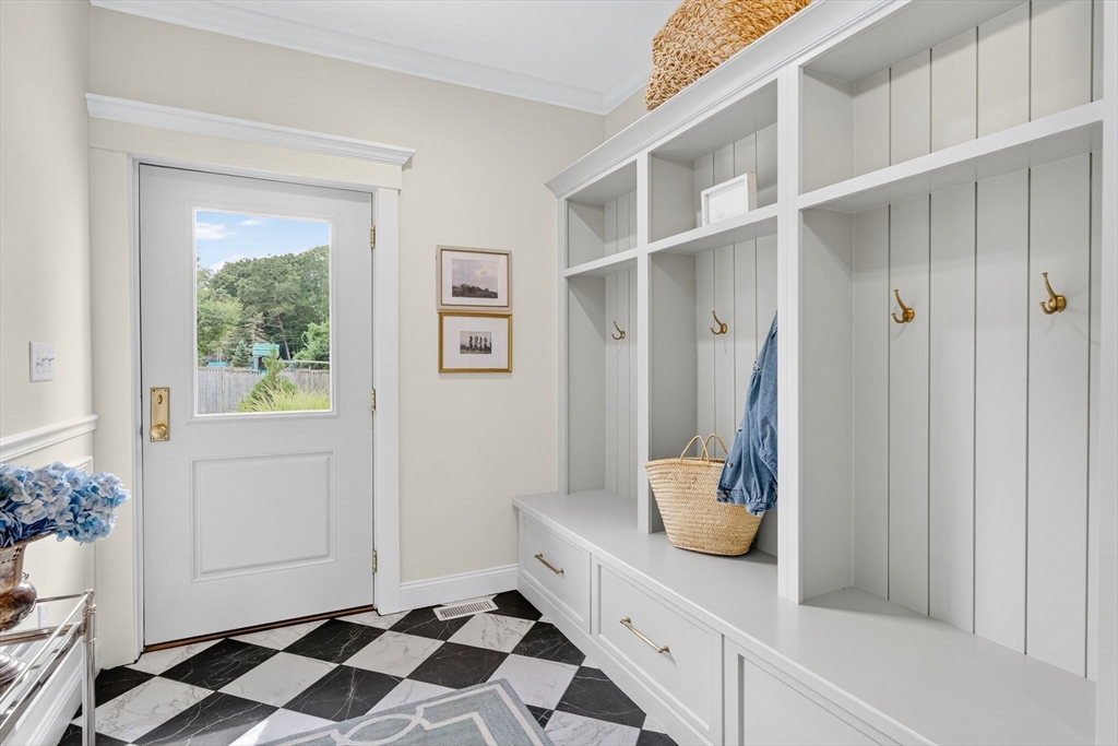 738 Smith Neck Road Dartmouth, MA 02748 - Photo 18 of 42 a room with a baby crib and a window