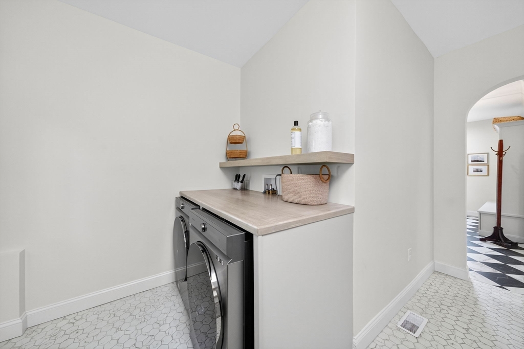 738 Smith Neck Road Dartmouth, MA 02748 - Photo 21 of 42 a utility room with dryer and washer