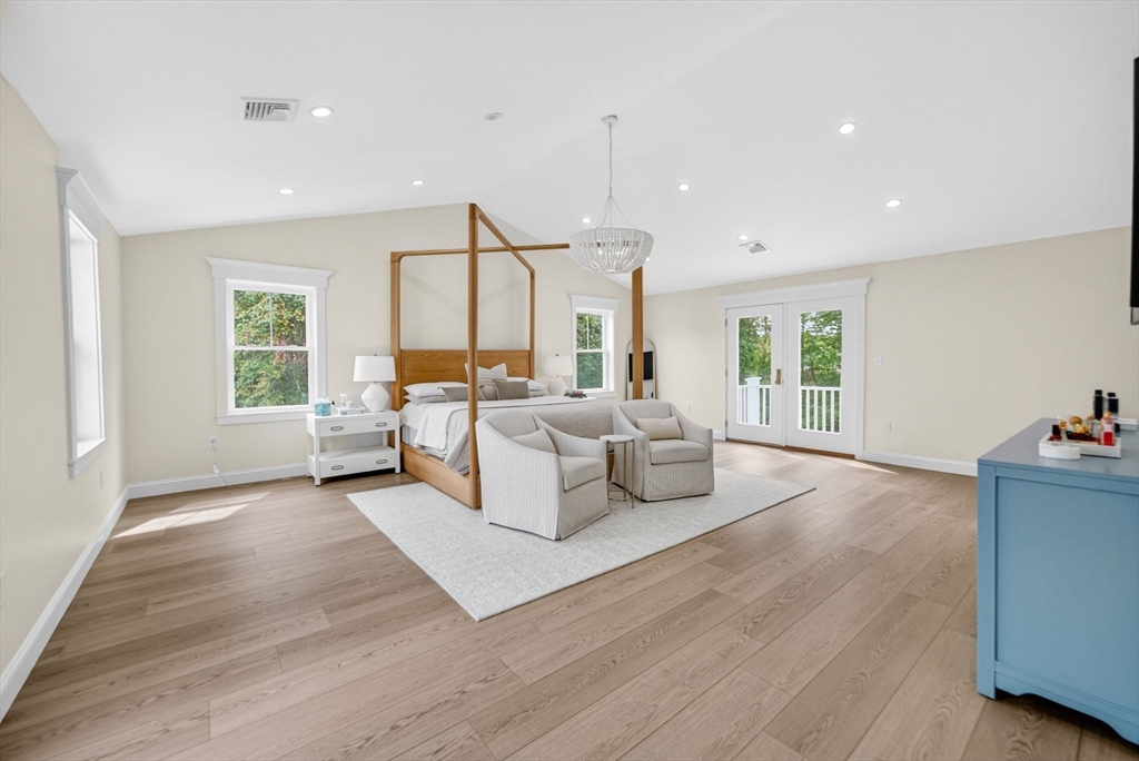 738 Smith Neck Road Dartmouth, MA 02748 - Photo 24 of 42 a living room with furniture and a large window