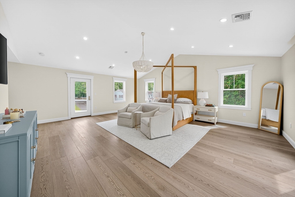 738 Smith Neck Road Dartmouth, MA 02748 - Photo 26 of 42 a living room with furniture and a large window