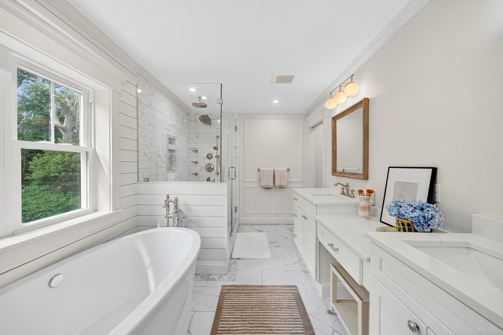 738 Smith Neck Road Dartmouth, MA 02748 - Photo 27 of 42 a spacious bathroom with a tub sink and mirror