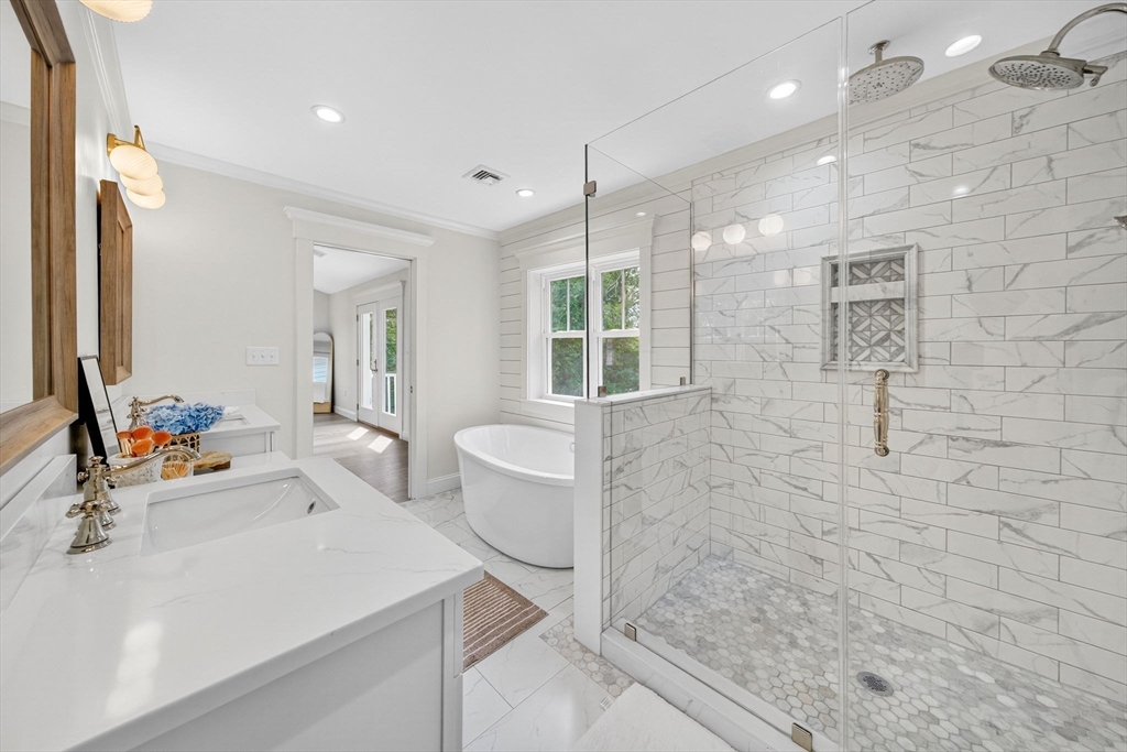 738 Smith Neck Road Dartmouth, MA 02748 - Photo 29 of 42 a bathroom with a sink a toilet and shower