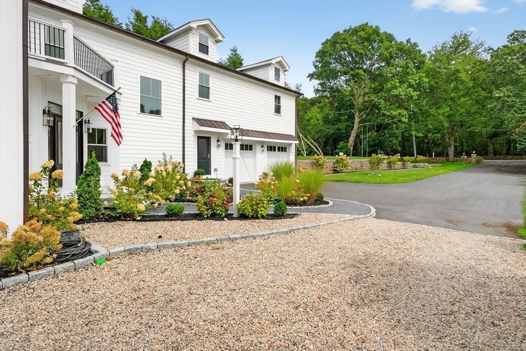 738 Smith Neck Road Dartmouth, MA 02748 - Photo 39 of 42 a front view of a house with garden
