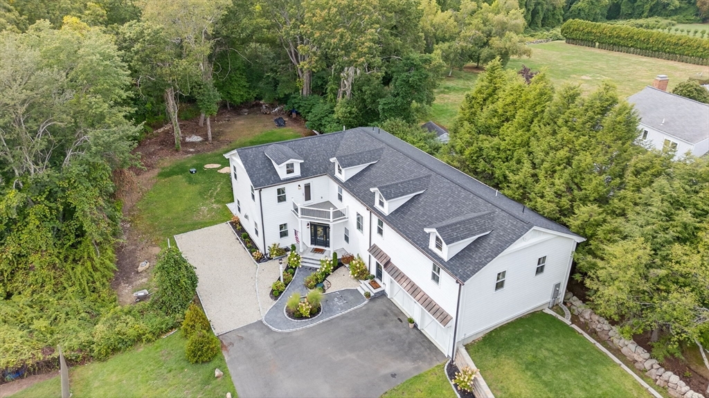 738 Smith Neck Road Dartmouth, MA 02748 - Photo 40 of 42 an aerial view of a house with outdoor space pool seating area and yard