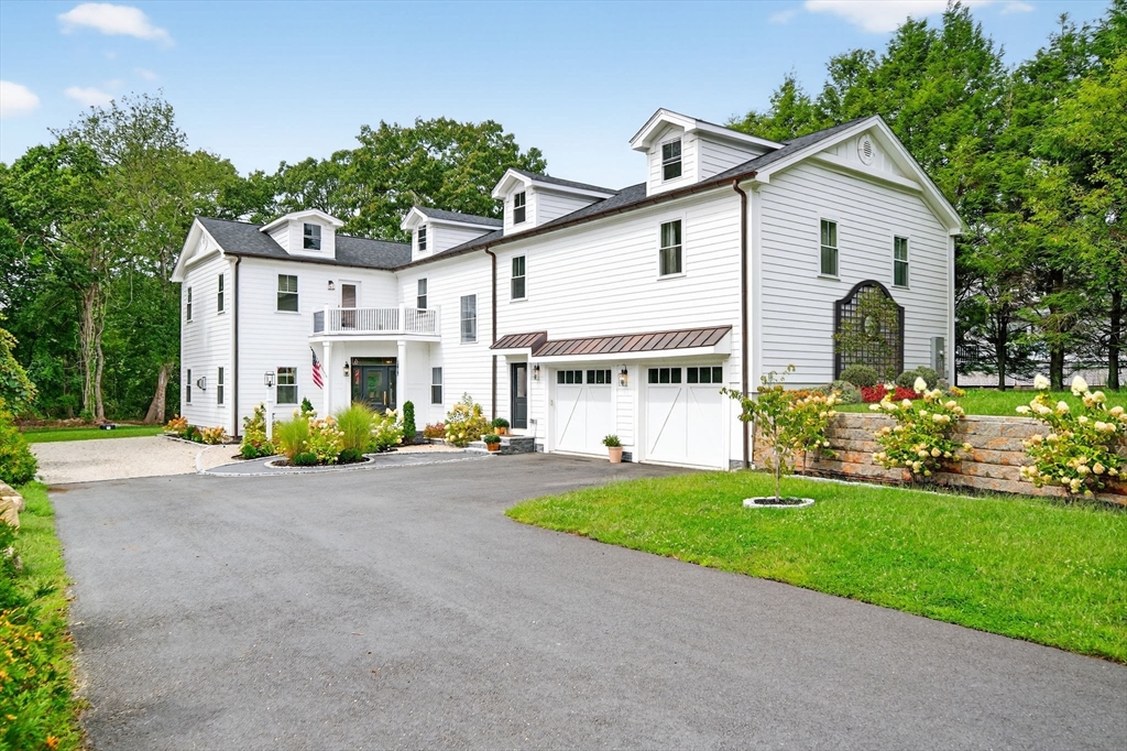 738 Smith Neck Road Dartmouth, MA 02748 - Photo 41 of 42 a front view of a house with a yard and porch