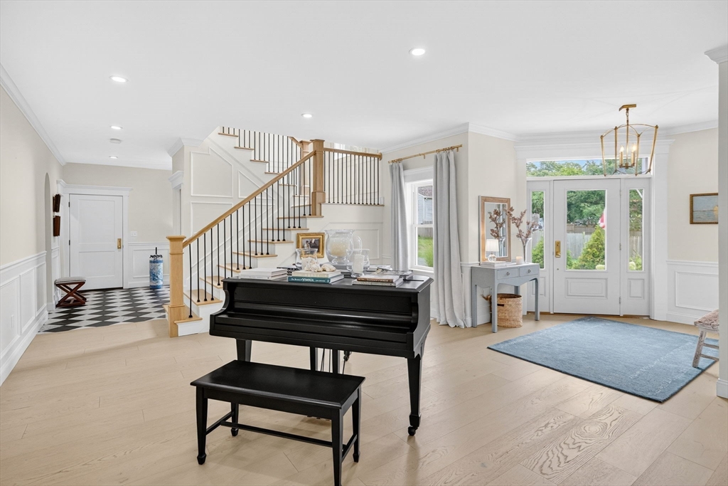 738 Smith Neck Road Dartmouth, MA 02748 - Photo 8 of 42 a living room with furniture and a wooden floor