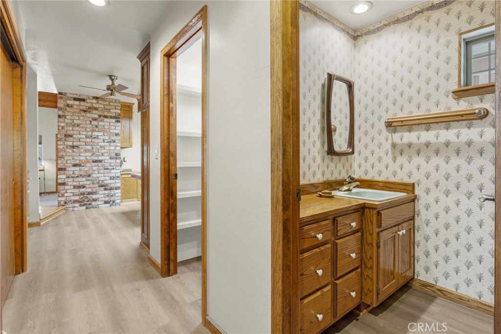 3582 Keefer Road Chico, CA 95973 - Photo 18 of 75 a bathroom with a granite countertop sink a mirror and a shower