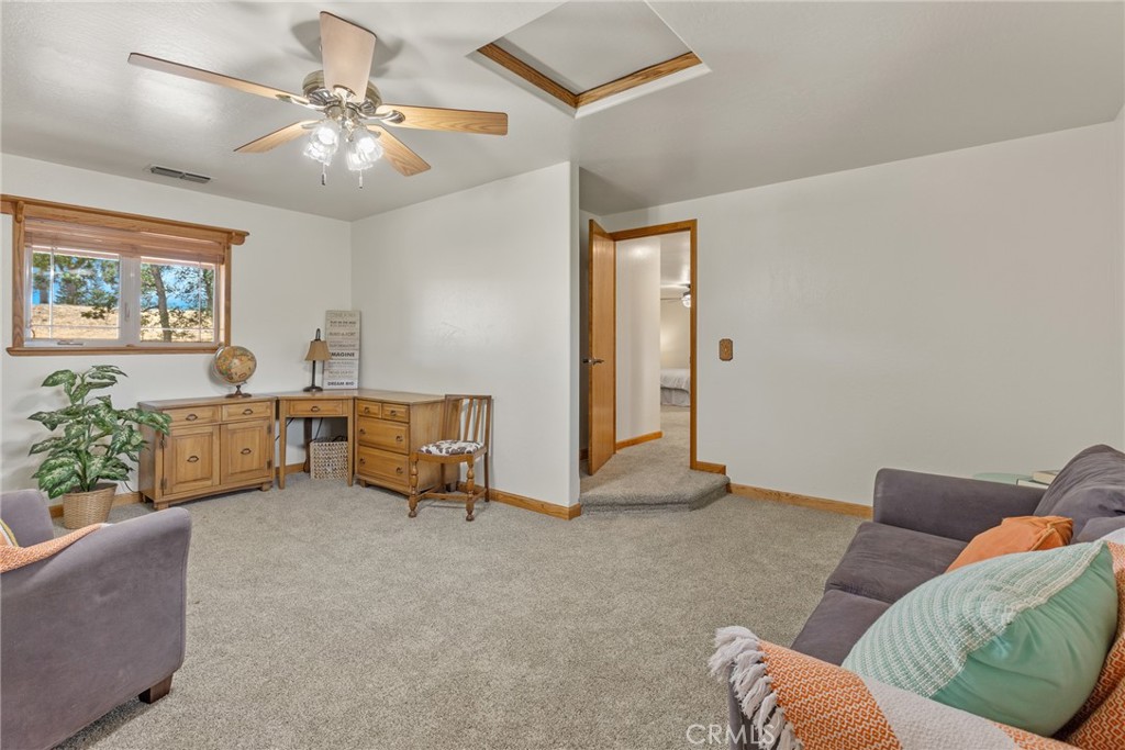 3582 Keefer Road Chico, CA 95973 - Photo 27 of 75 a living room with furniture and a chandelier