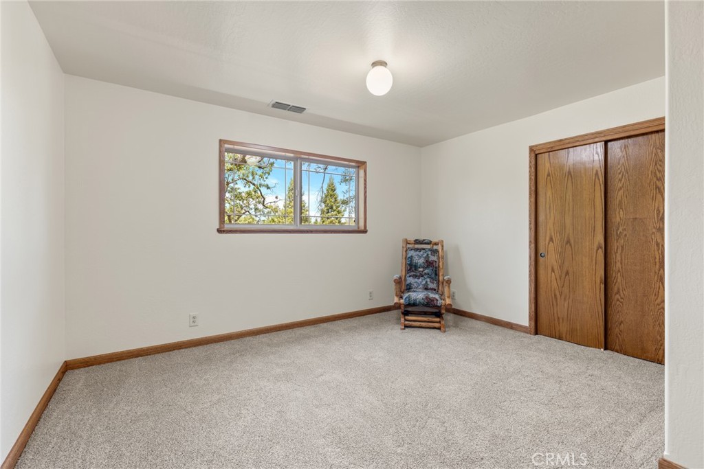 3582 Keefer Road Chico, CA 95973 - Photo 29 of 75 a room with a window and a ceiling fan