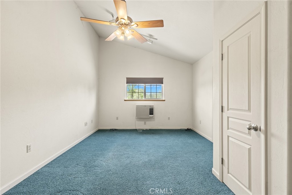 3582 Keefer Road Chico, CA 95973 - Photo 54 of 75 an empty room with windows and fan