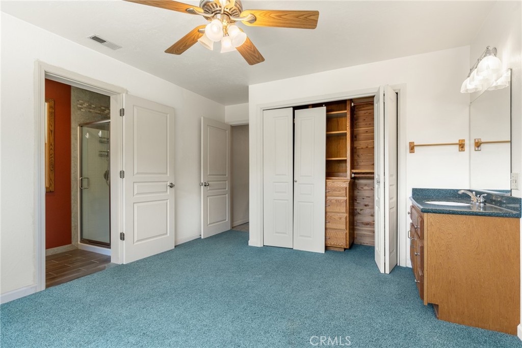3582 Keefer Road Chico, CA 95973 - Photo 58 of 75 an empty room with closet and a ceiling fan