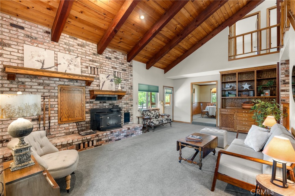 3582 Keefer Road Chico, CA 95973 - Photo 10 of 75 a living room with furniture a fireplace and a table