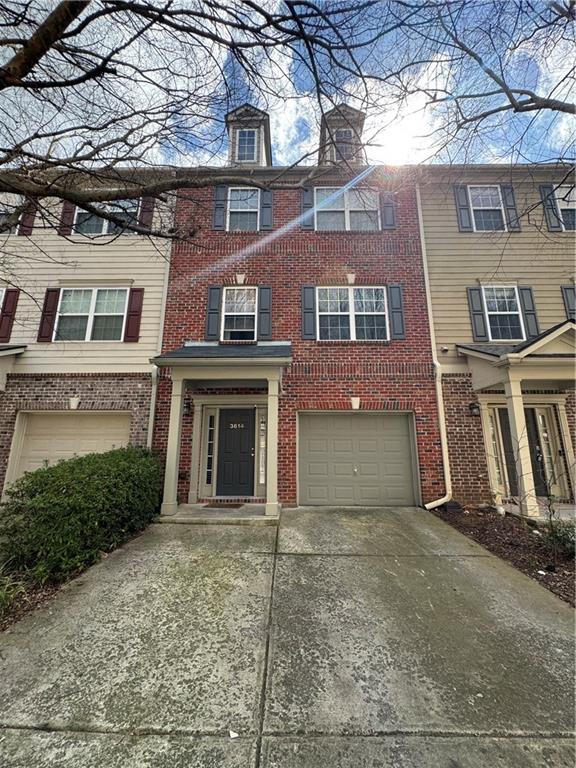 3614 Utoy Drive Southwest Atlanta, GA 30331 - Photo 1 of 1 a front view of a house with a yard