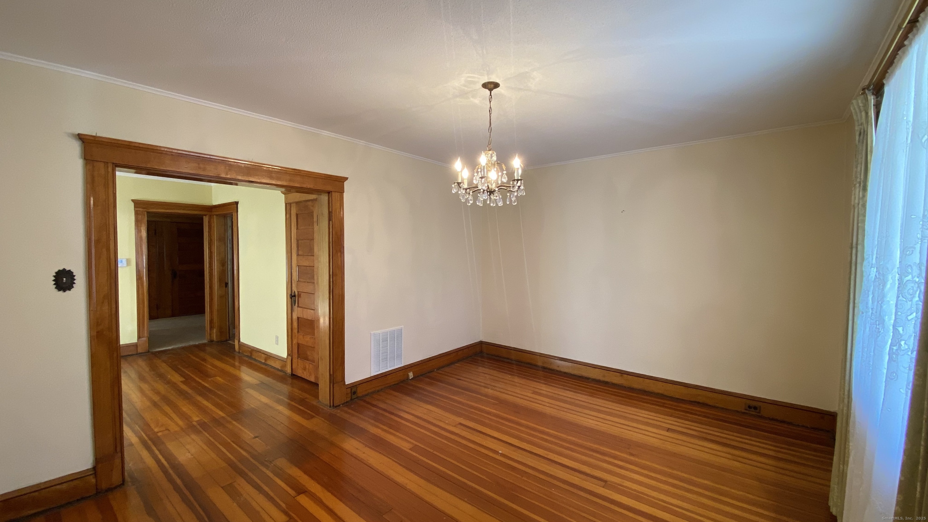 135 Elm Street, Unit 1 Winsted, CT 06098 - Photo 15 of 32 a view of a room with wooden floor