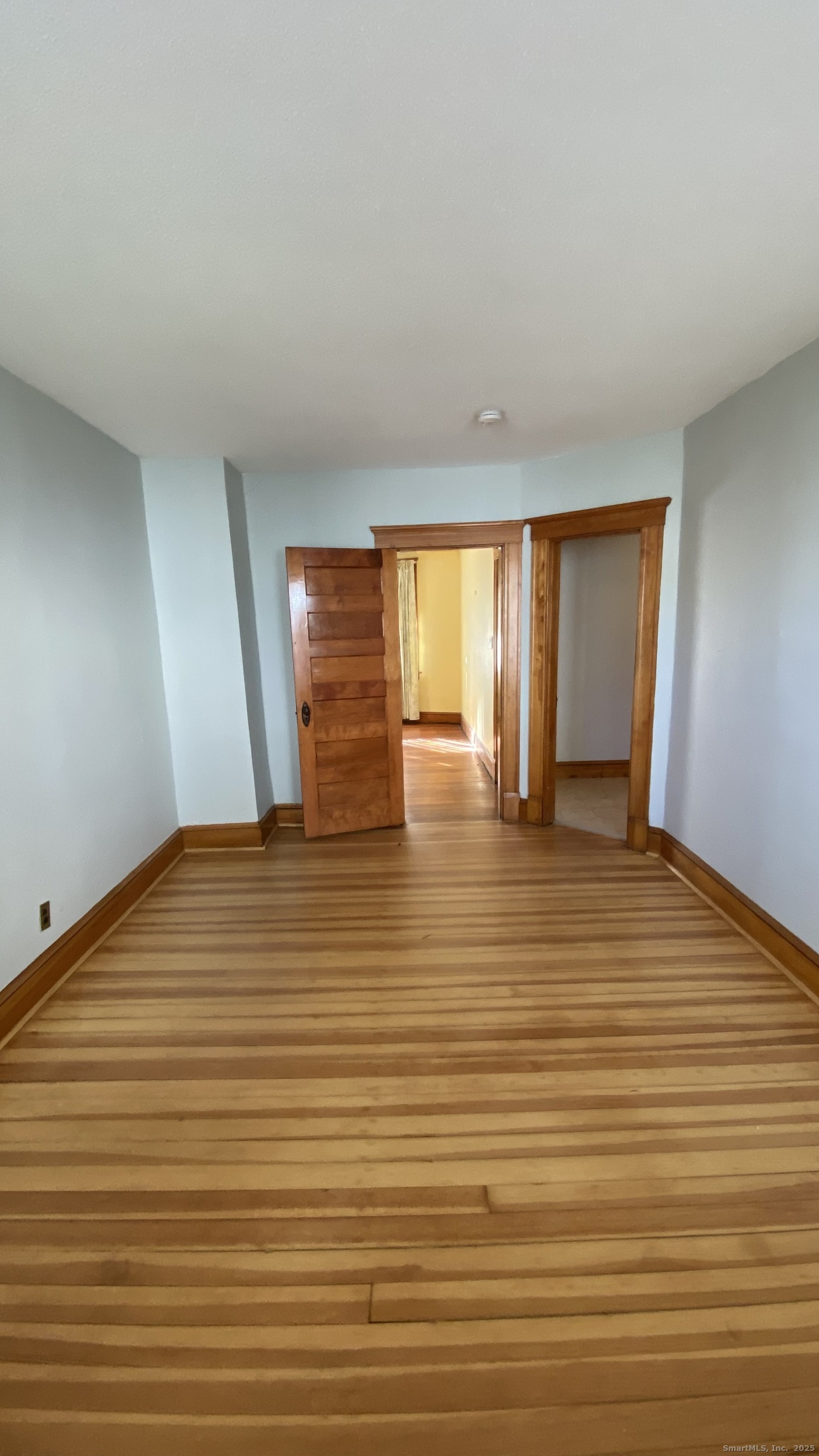 135 Elm Street, Unit 1 Winsted, CT 06098 - Photo 22 of 32 a view of an empty room and window