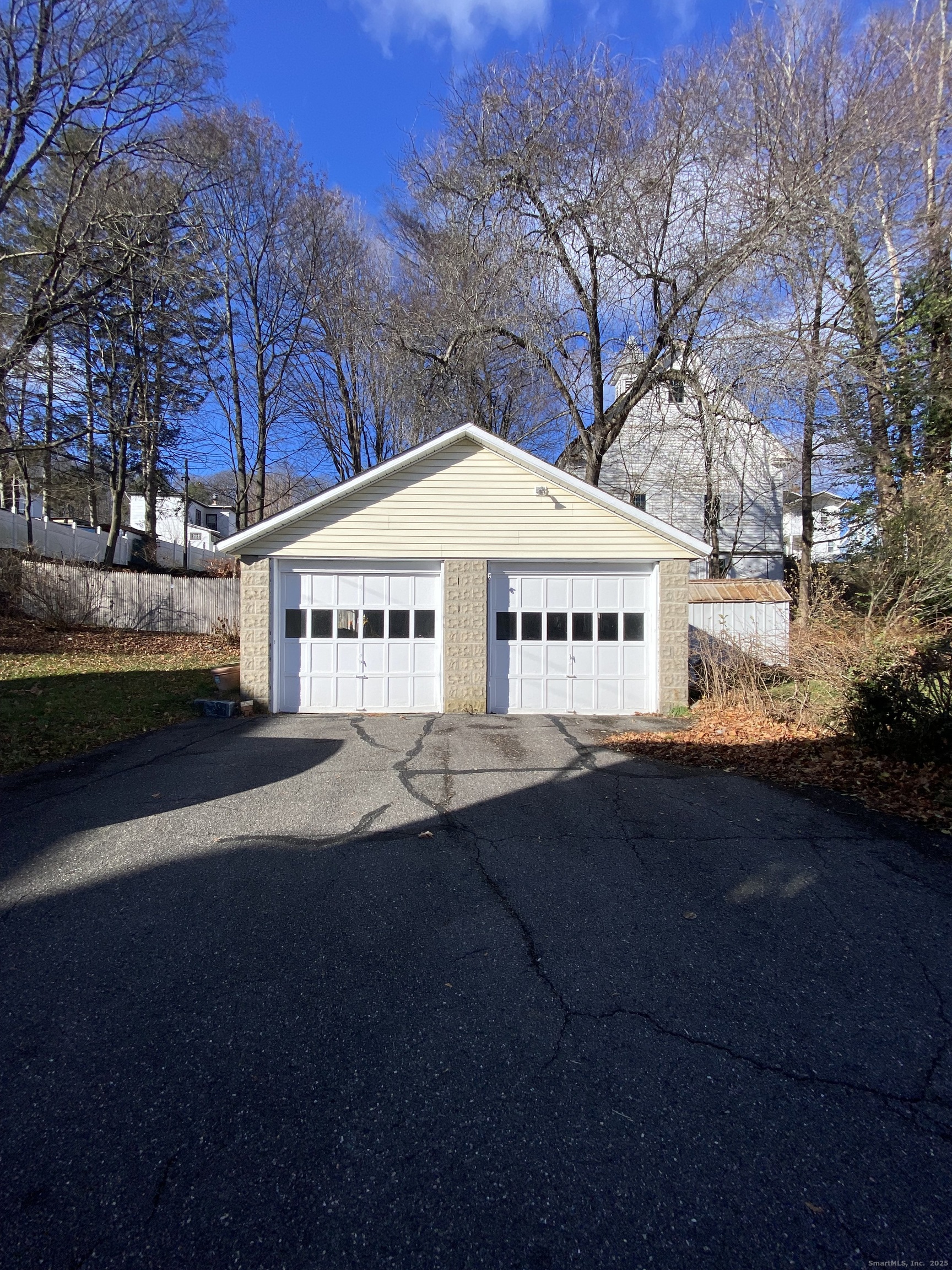 135 Elm Street, Unit 1 Winsted, CT 06098 - Photo 4 of 32 a view of a house with a yard