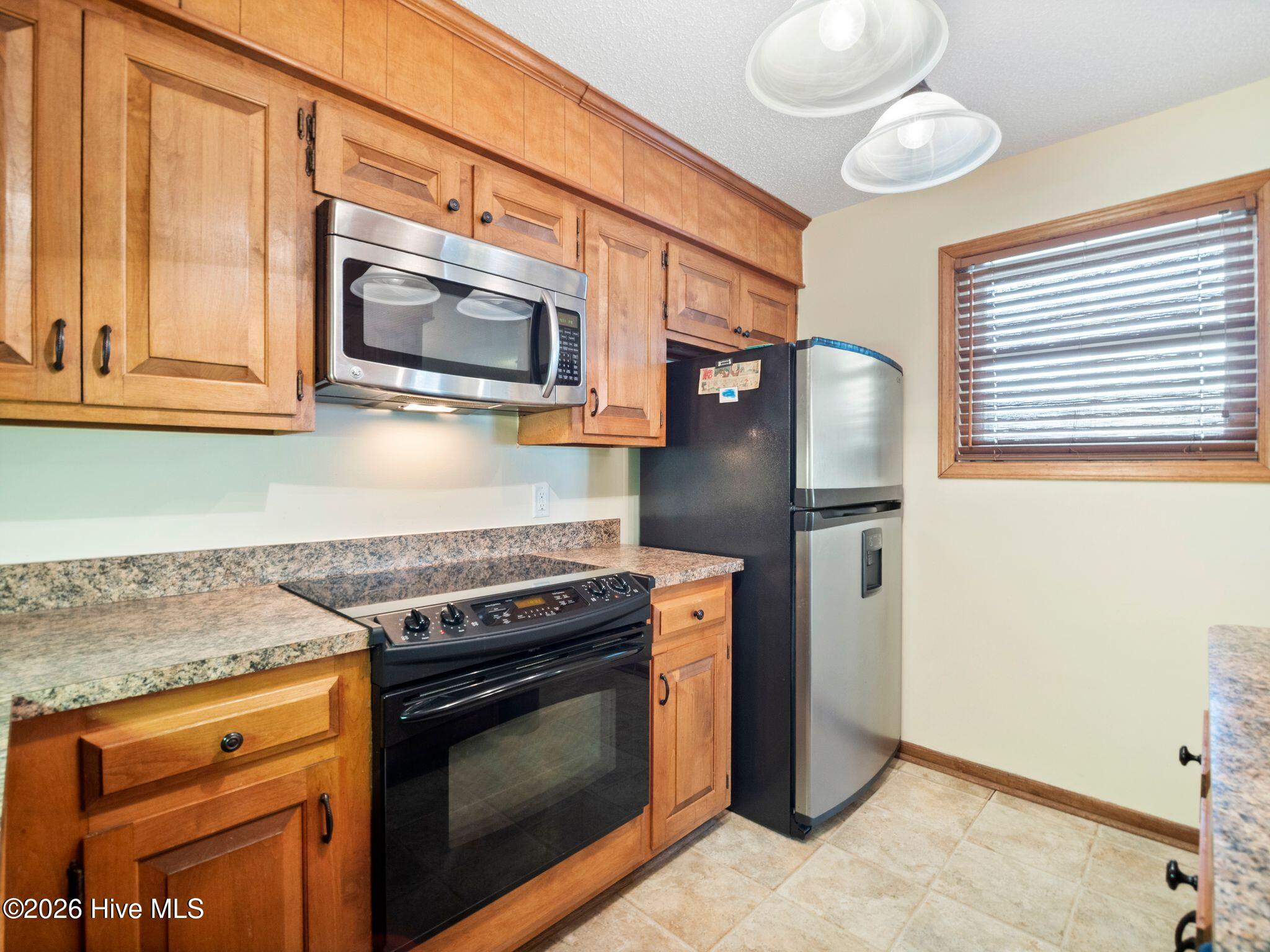 1896 New River Inlet Road, Unit 1119 North Topsail Beach, NC 28460 - Photo 16 of 39 Kitchen