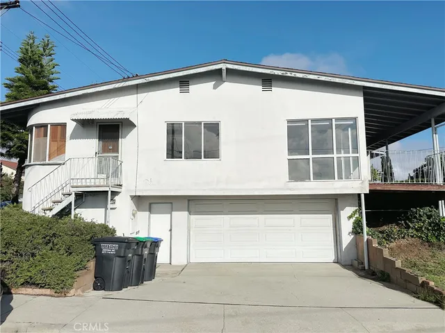 a front view of a house with windows