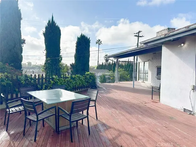 a view of a balcony with chairs