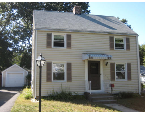194 Dayton Street Springfield, MA 01118 - Photo 1 of 20 a front view of a house with a yard