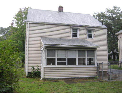 194 Dayton Street Springfield, MA 01118 - Photo 18 of 20 a front view of a house with a yard