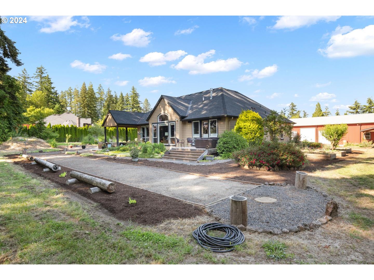 8225 Northeast Dog Ridge Road Newberg, OR 97132 - Photo 26 of 48 a front view of a house with a yard