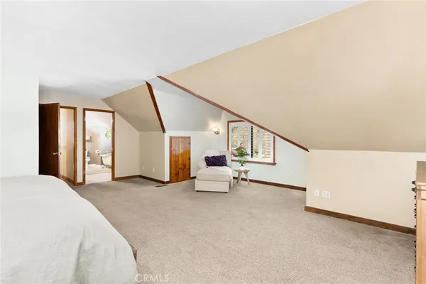 a view of an empty room with stairs
