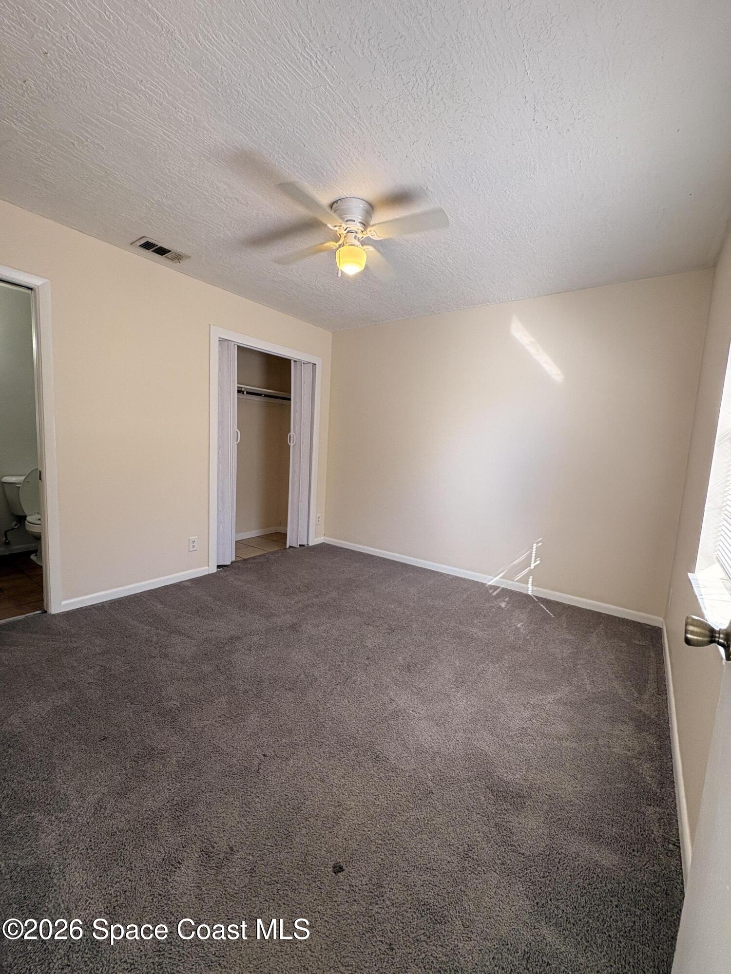 2000 Agora Circle Southeast, Unit 201 Palm Bay, FL 32909 - Photo 6 of 10 a view of empty room