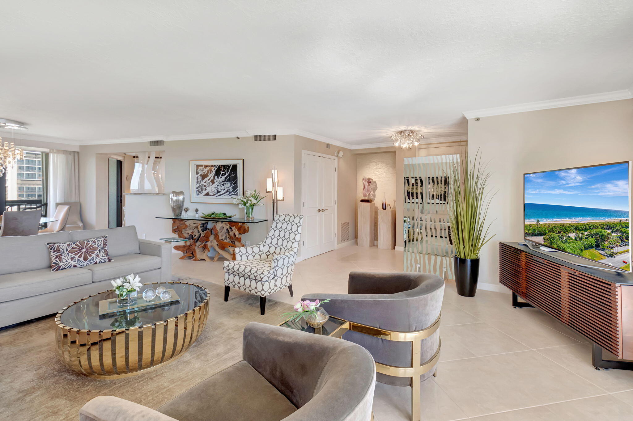 4545 North Ocean Boulevard, Unit 11C Boca Raton, FL 33431 - Photo 13 of 58 a living room with furniture and wooden floor