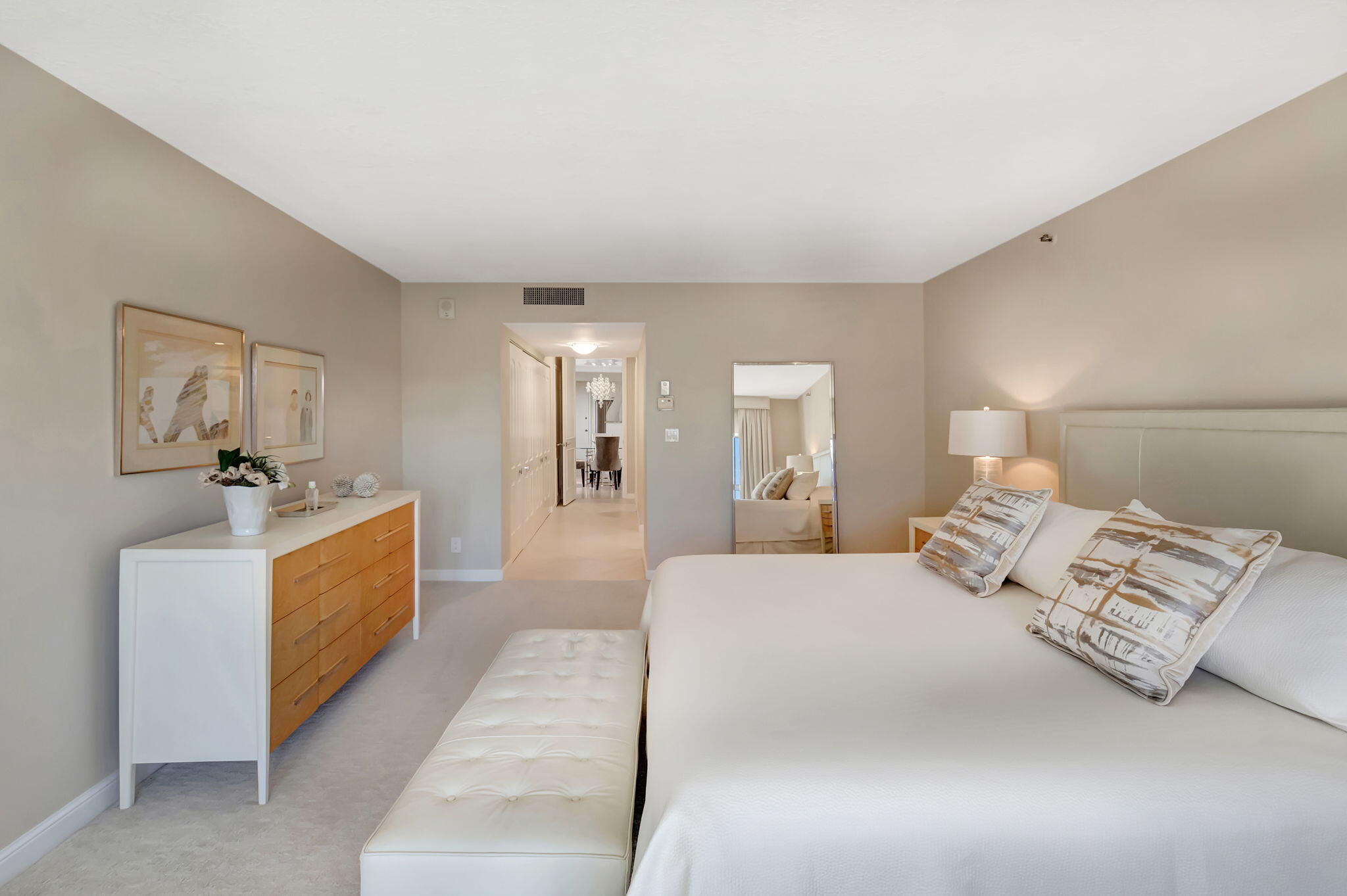 4545 North Ocean Boulevard, Unit 11C Boca Raton, FL 33431 - Photo 29 of 58 a bedroom with a bed and a couch