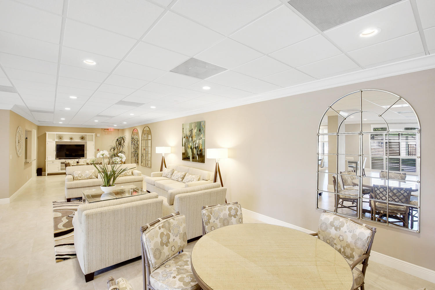 4545 North Ocean Boulevard, Unit 11C Boca Raton, FL 33431 - Photo 56 of 58 a living room with furniture a large window and a table