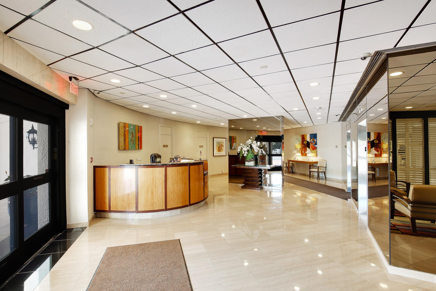 4545 North Ocean Boulevard, Unit 11C Boca Raton, FL 33431 - Photo 57 of 58 a living room with furniture and a flat screen tv