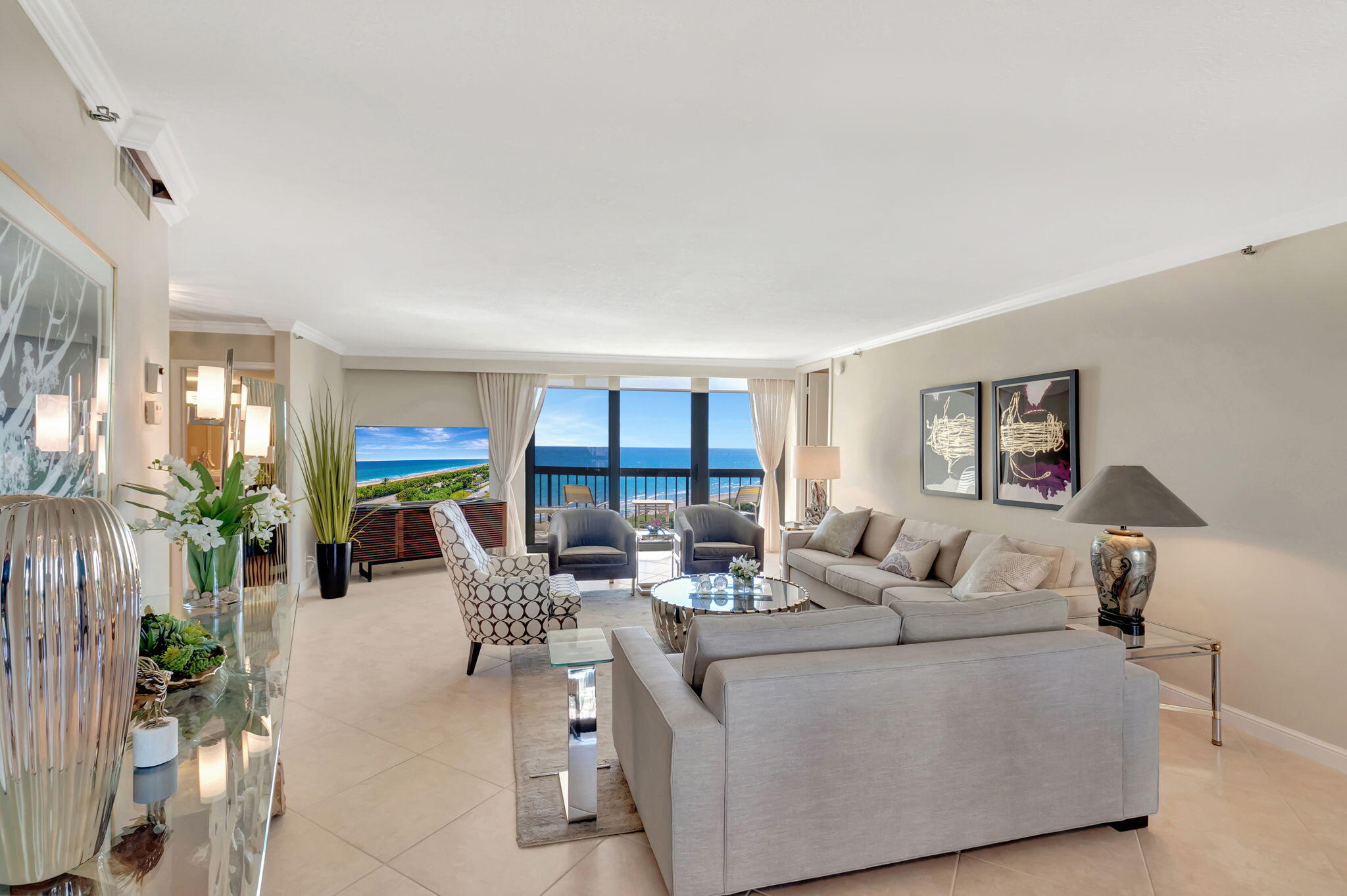 4545 North Ocean Boulevard, Unit 11C Boca Raton, FL 33431 - Photo 8 of 58 a living room with furniture and a large window
