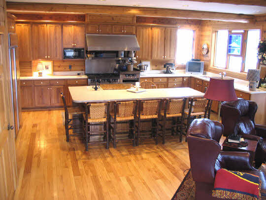20820 Free Church Road Caledonia, IL 61011 - Photo 3 of 6 a dining room with furniture a rug and a chandelier