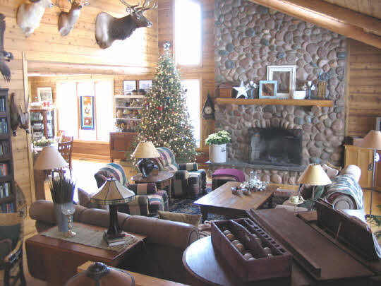 20820 Free Church Road Caledonia, IL 61011 - Photo 6 of 6 a living room with furniture and a fireplace