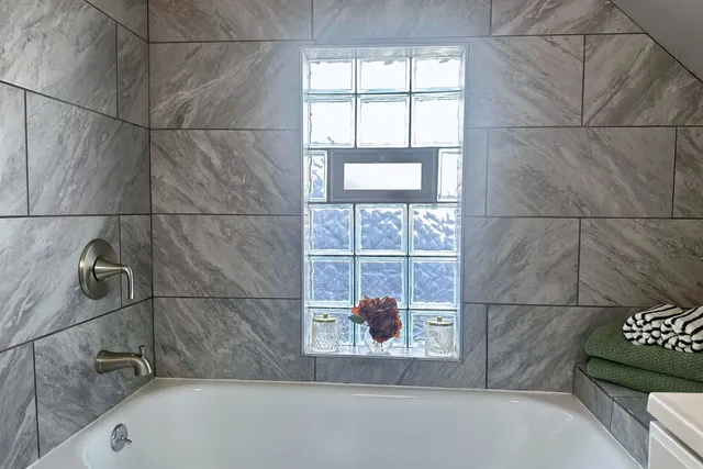 a bathroom with a bathtub