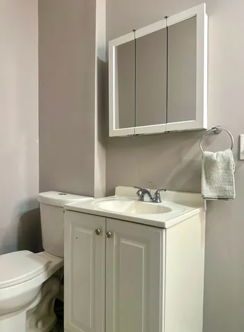 a bathroom with a sink and a toilet