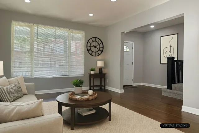 a living room with furniture and a table