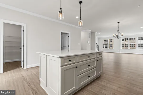 a view with a double vanity sink and a large mirror