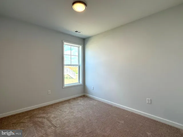 an empty room with window