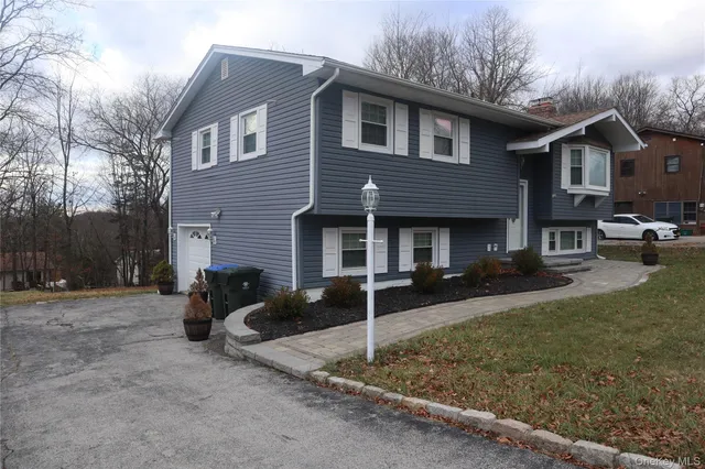a front view of a house with patio
