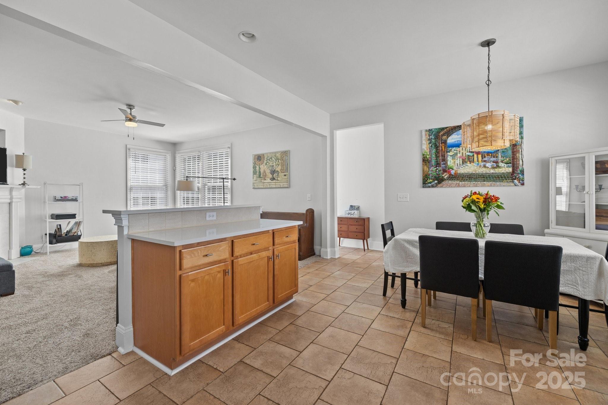 3208 Fifth Baxter Crossing Fort Mill, SC 29708 - Photo 18 of 38 a living room with granite countertop furniture and a dining table