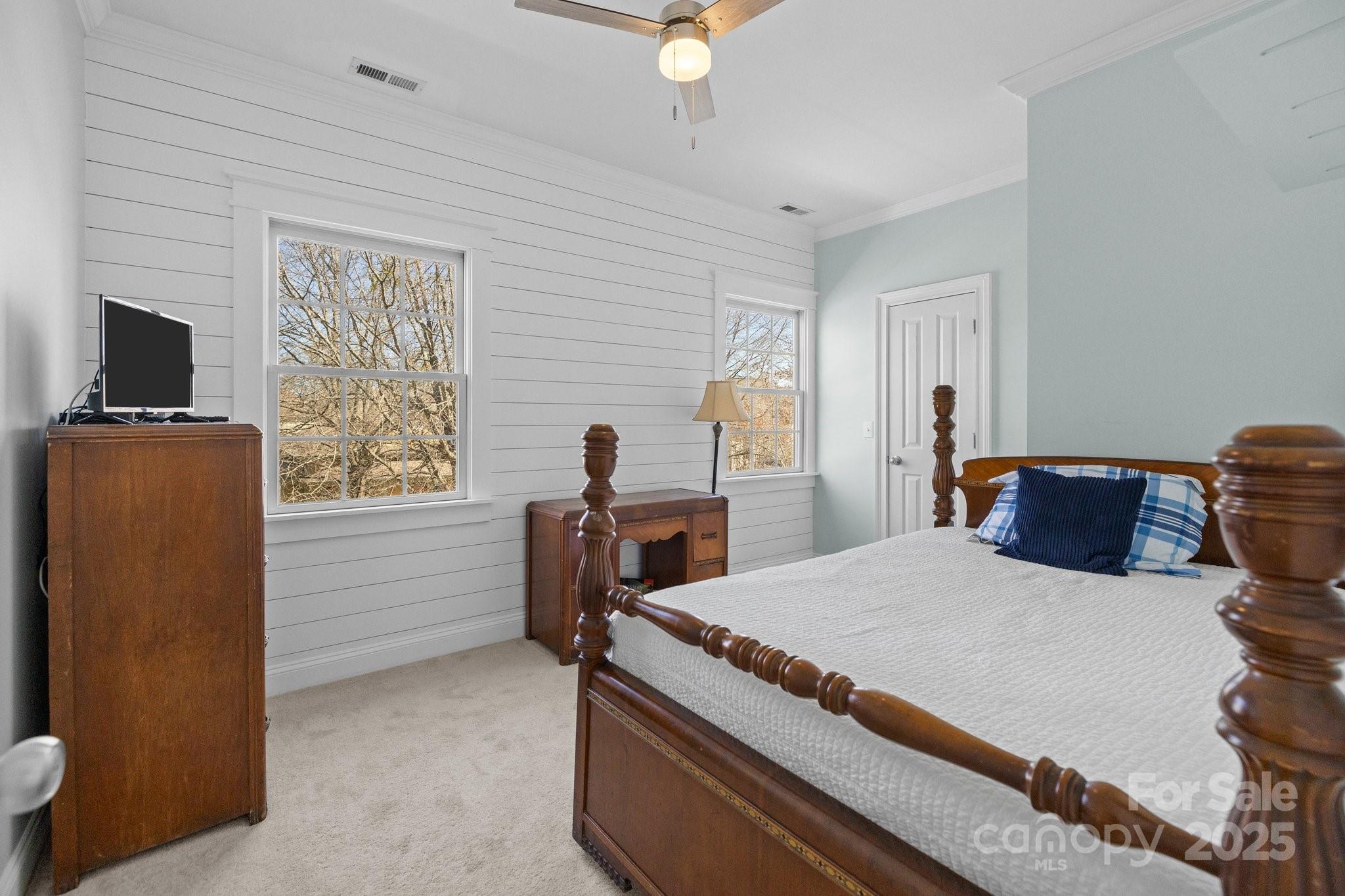 3208 Fifth Baxter Crossing Fort Mill, SC 29708 - Photo 24 of 38 a bedroom with a bed and a flat screen tv