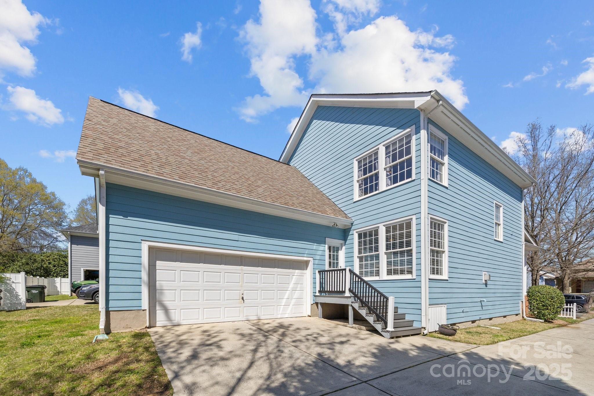 3208 Fifth Baxter Crossing Fort Mill, SC 29708 - Photo 31 of 38 a front view of a house with garden