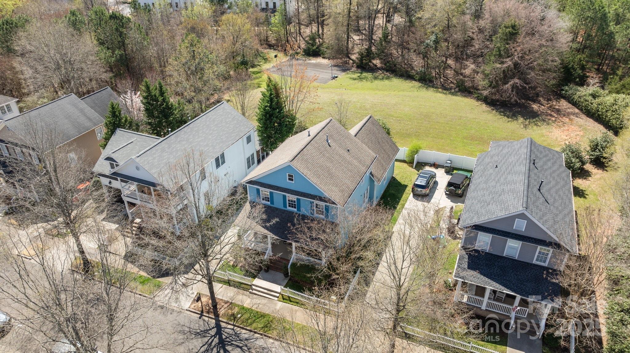 3208 Fifth Baxter Crossing Fort Mill, SC 29708 - Photo 35 of 38 an aerial view of a house with a yard basket ball court and outdoor seating