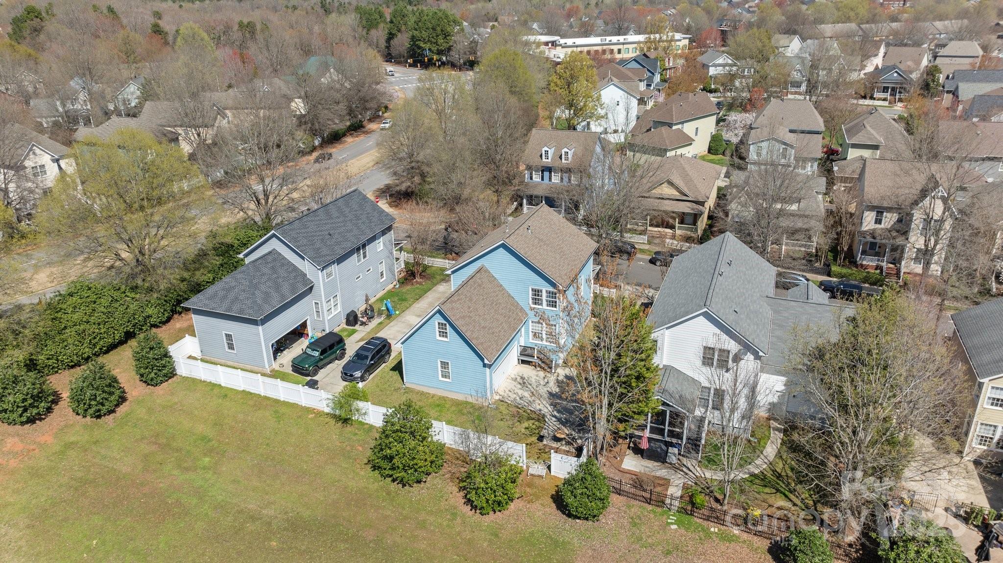 3208 Fifth Baxter Crossing Fort Mill, SC 29708 - Photo 37 of 38 an aerial view of a house with a yard and lake view
