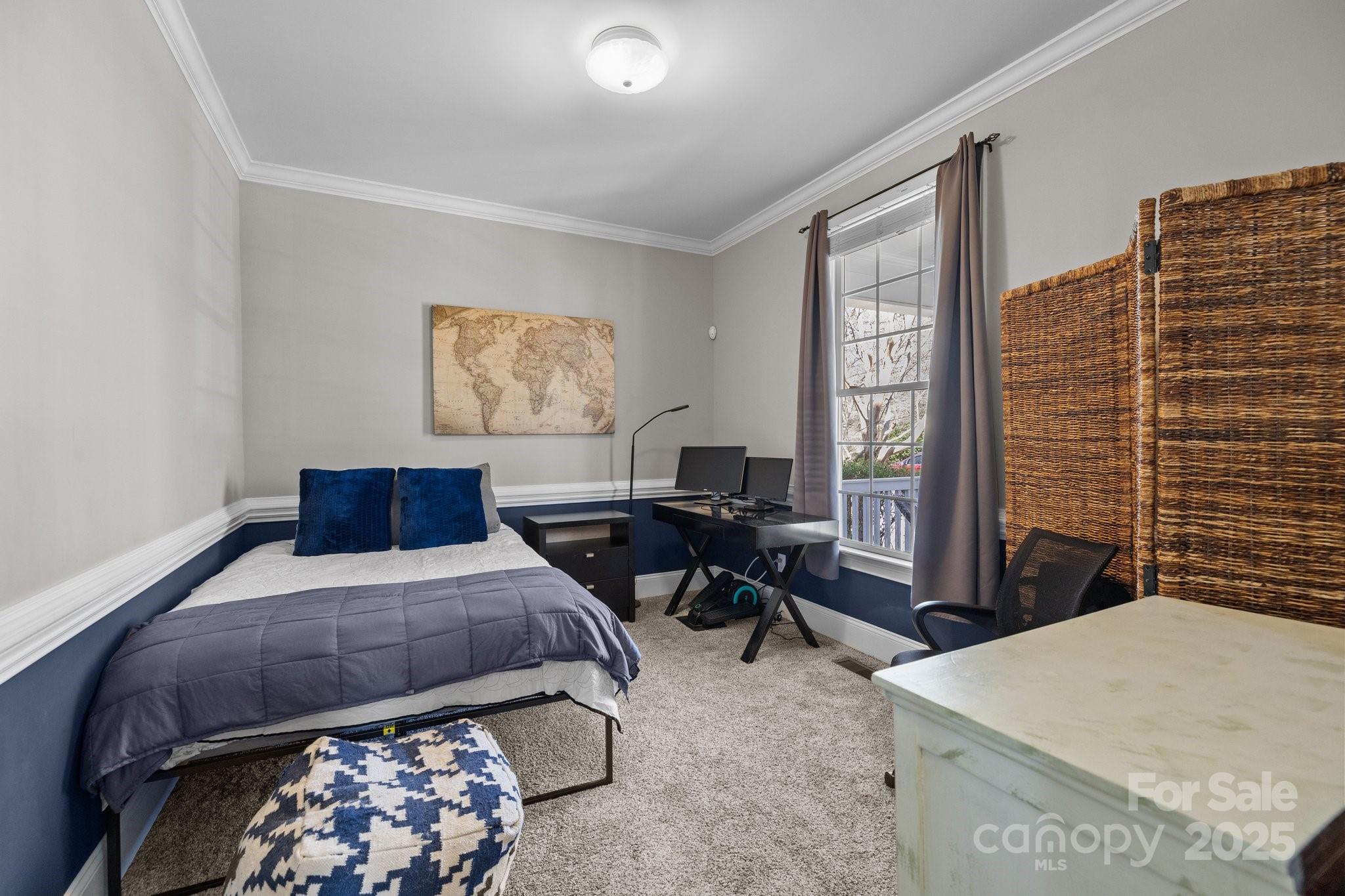 3208 Fifth Baxter Crossing Fort Mill, SC 29708 - Photo 7 of 38 a bedroom with a bed and a desk