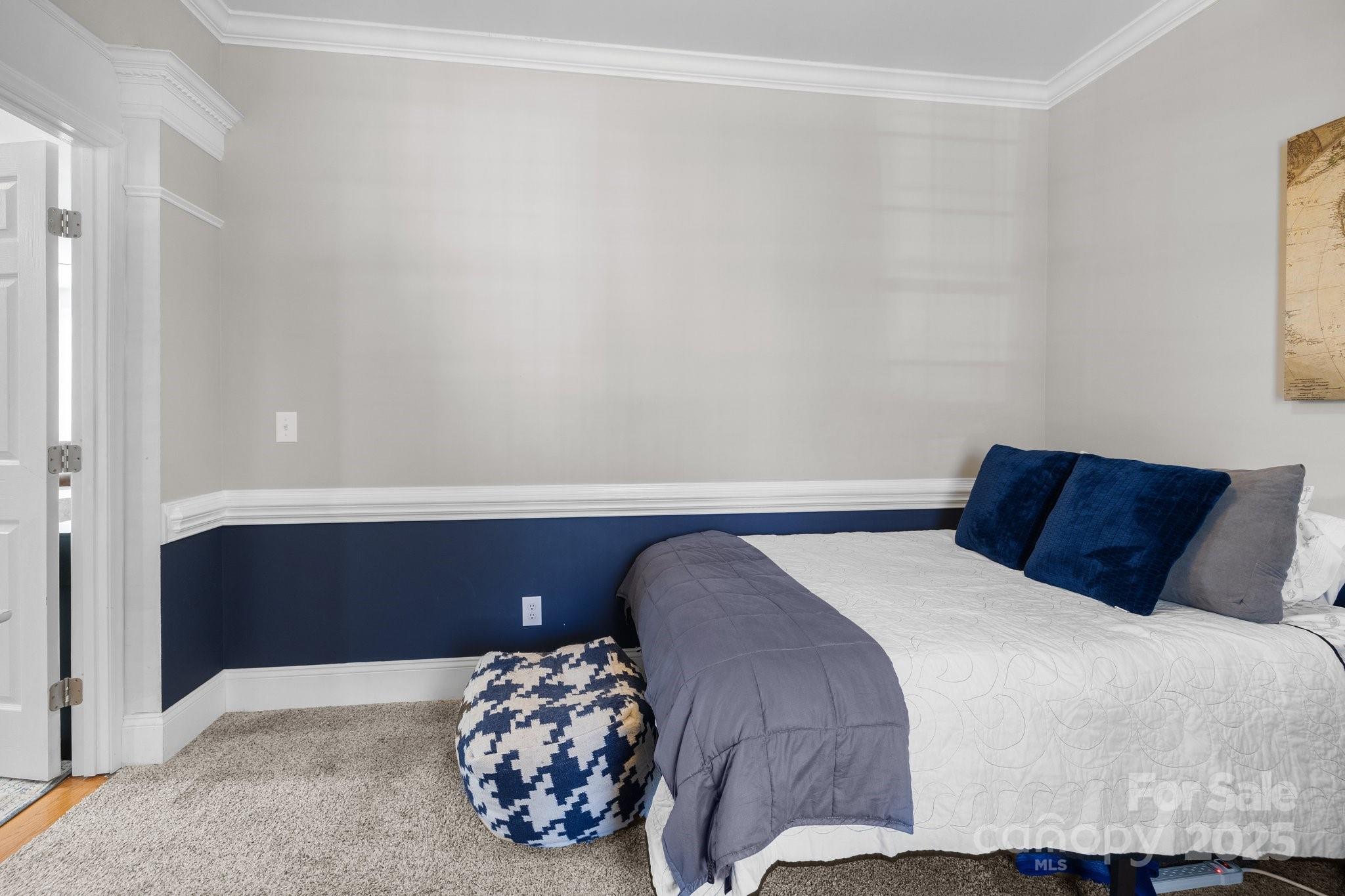 3208 Fifth Baxter Crossing Fort Mill, SC 29708 - Photo 8 of 38 a bedroom with a bed and a window